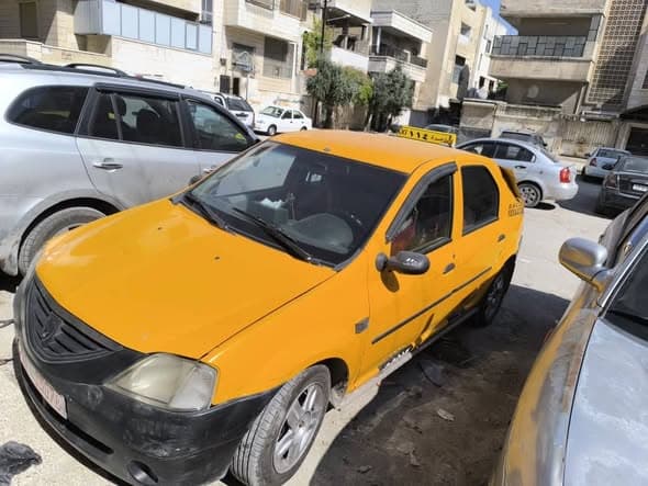 رينو لوغان 2005